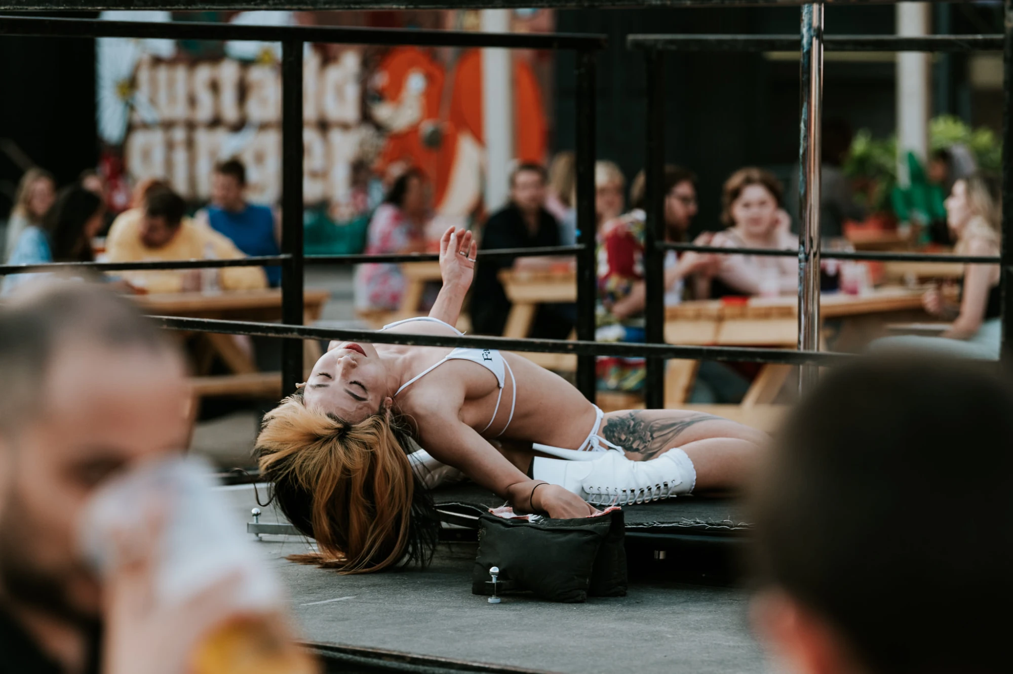 a woman is on the pole.